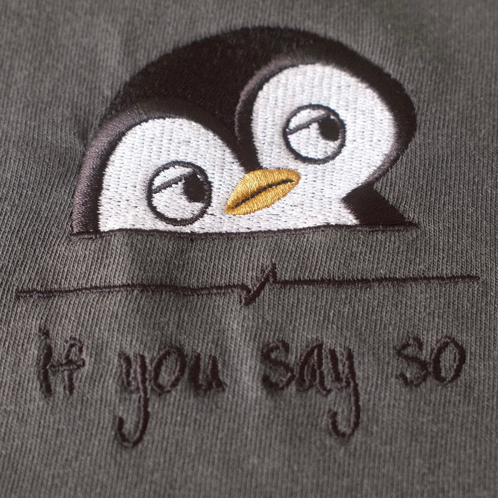 Embroidered penguin detail close-up