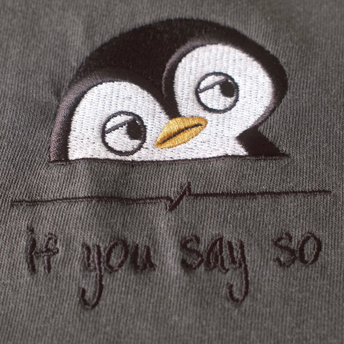 Embroidered penguin detail close-up