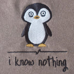 Embroidered penguin detail close-up