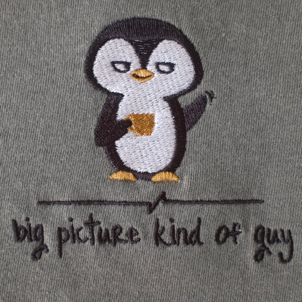 Embroidered penguin detail close-up
