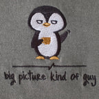 Embroidered penguin detail close-up