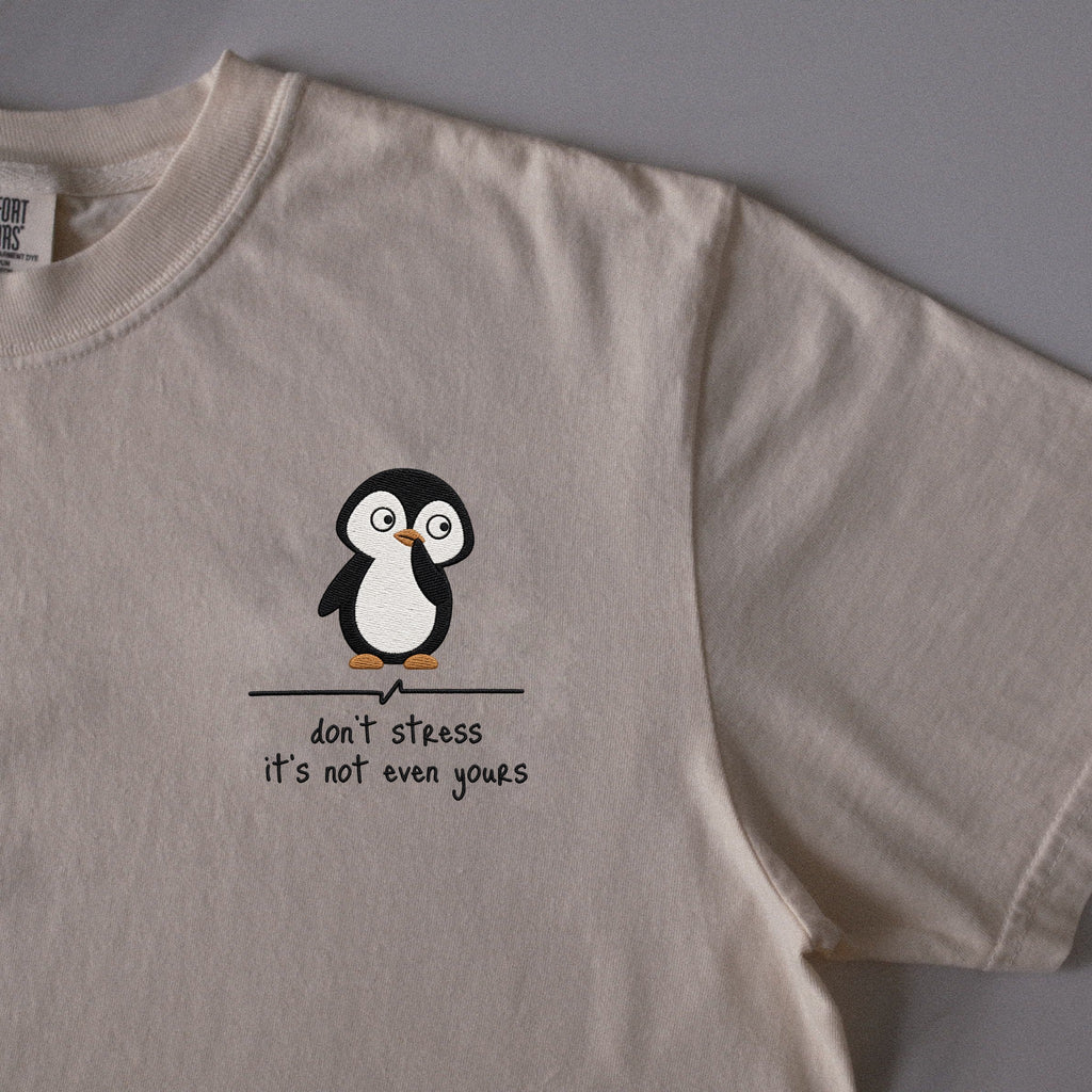 Don't Stress, It's Not Even Yours embroidered t-shirt in Ivory