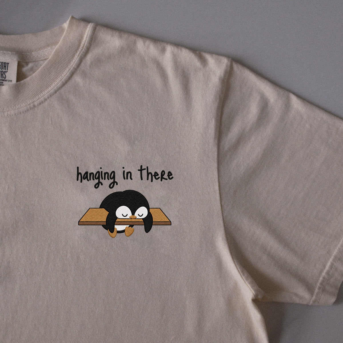 Hanging in There embroidered t-shirt in Ivory